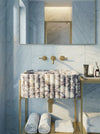 Close-up of Calacatta Viola marble veining on a Calacatta Viola fluted marble vessel sink