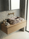 Natural stone washbasin detail with one-of-one Calacatta Viola marble movement