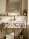 Hand-carved metal stand sink profile for a custom marble bathroom sink