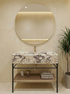 Designer bathroom view of a Calacatta Viola marble sink with metal stand for custom interiors