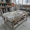 Natural stone washbasin detail with one-of-one Calacatta Viola marble movement